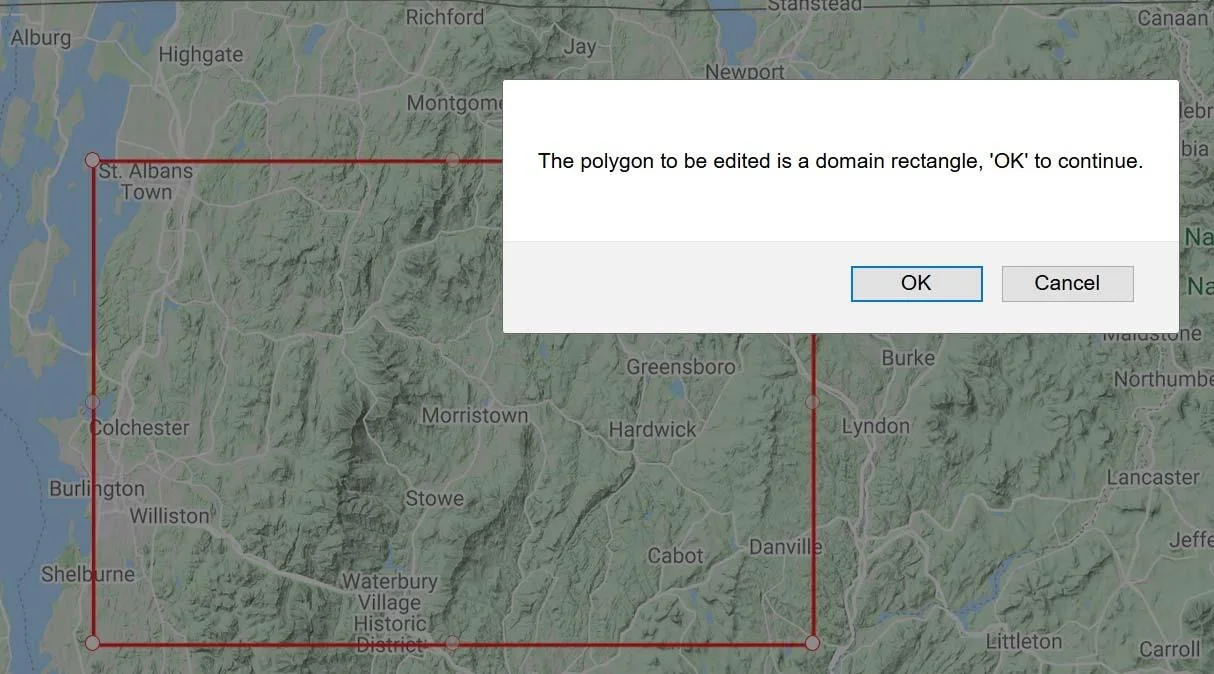 Confirmation dialog box that appears after clicking inside the model domain, asking the user to confirm the domain extent and click OK to proceed